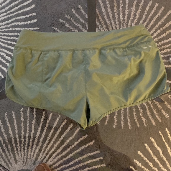 Nike Drifit running shorts in sage green - Picture 2 of 6